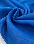 Light and soft linen and polyester organza in bright blue doubled. High-quality deadstock fabric collected in Stock from a Maison de Couture in Italy.