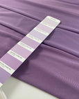 Stretch microtulle in regal orchid. Very light, transparent, flowy and soft – ideal for dresses, underwear, and t-shirts. High-quality deadstock collected in Stock from a Maison de Couture in Italy.