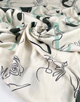 Pure viscose with a beautiful minimal design. The ground is light vanilla and the print is in the shades of green and black. The fabric is very soft and light. High-quality deadstock fabric collected in Stock from a Maison de Couture in Italy.