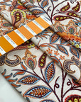 Pure viscose with a lurex stripe. The ground is white with a cashmere design in orange, light blue, and red shades. It is very soft and flowy. Ideal for dresses, blouses, shirts, and skirts. High-quality deadstock fabric by the meter collected in Stock from a Maison de Couture in Italy.