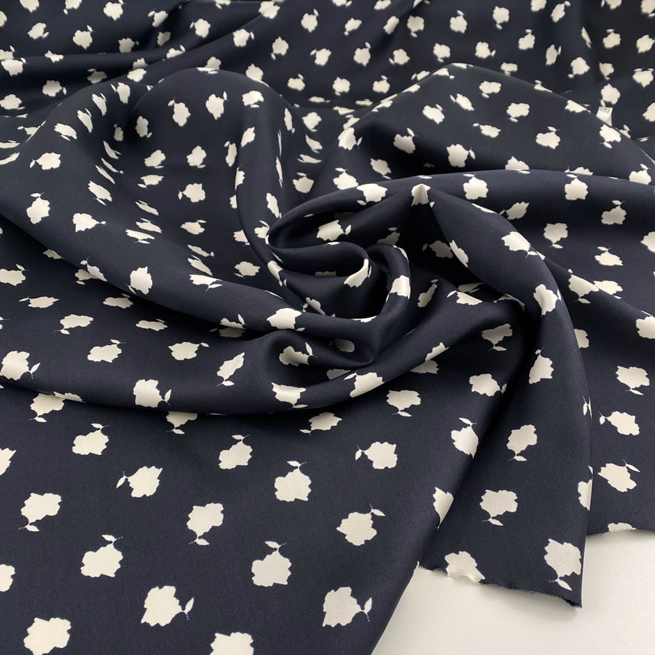 Pure printed silk twille blue and white. Falling, light and floral. High-quality deadstock fabric by the meter collected in Stock from a Maison de Couture in Italy.