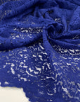 Blue viscose and polyester lace with double scalloped. Floral design very soft and light. High-quality deadstock fabric collected in Stock from a Maison de Couture in Italy.