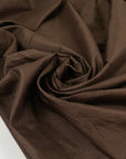 Pure silk, very light and soft, in chocolate brown shades. High-quality deadstock fabric by the meter collected in Stock from a Maison de Couture in Italy.