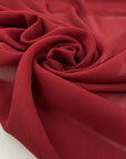 Pure viscose in georgette bordeaux is very soft, transparent and flowy. High-quality deadstock fabric by the meter collected in Stock from a Maison de Couture in Italy.