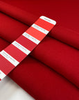 Double wool crepe in red, heavy and flowy. High-quality deadstock collected in Stock from a Maison de Couture in Italy.