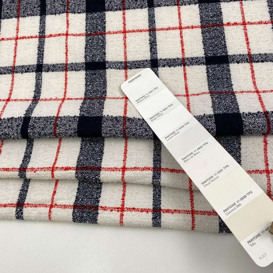 Multicolored bouclé fabric made of cotton, viscose and polyester. High quality deadstock fabric collected in Stock from a Maison de Couture in Italy.