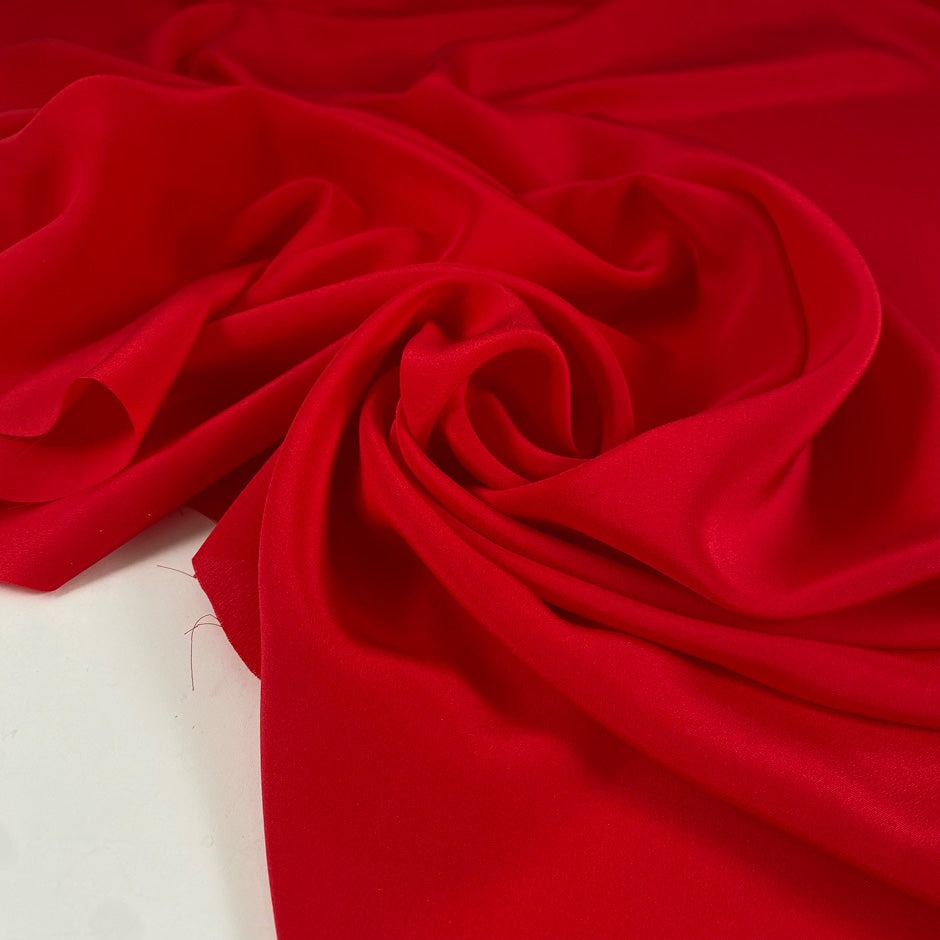 Pure silk crepe de chine, color reference Chinese red, very soft flowy a little shiny. Ideal for skirts, skirts, kimono, and dresses. High-quality deadstock fabric by the meter collected in Stock from a Maison de Couture in Italy.