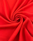 Red viscose-acetate crepe cady, soft, fluid and non-stretch. Perfect for trousers. High-quality deadstock collected in Stock from a Maison de Couture in Italy.
