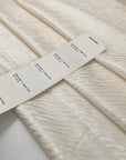 Pure silk jacquard in natural white, very soft, light, flowy, and light. High-quality deadstock fabric collected in Stock from a Maison de Couture in Italy.