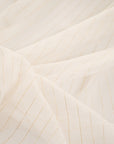 White silk fabric with gold stripes, very light and trasparent. High quality deadstock fabric.
