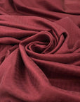 Pure soft silk twill with jacquard textured in pomegranate red. High-quality deadstock fabric collected in Stock from a Maison de Couture in Italy.