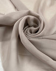 Pure silk georgette in gray shades. Very soft, light and transparent. High-quality deadstock fabric by the meter collected in Stock from a Maison de Couture in Italy.