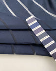 Blue silk and polyester organza with stripes. High-quality deadstock fabric collected in Stock from a Maison de Couture in Italy.
