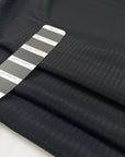 Black structured silk and acetate jacquard. High-quality deadstock fabric collected in Stock from a Maison de Couture in Italy.
