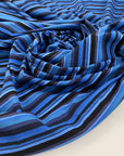 Multicolored blue cotton knit, stretchy, soft and droopy. High quality deadstock fabric.