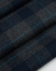 Blue and gray square flannel in pure virgin wool. High-quality deadstock fabric by the meter collected in Stock from a Maison de Couture in Italy.