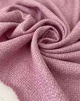 Cotton and viscose tweed in pink color, reference Pink Lavender. Very soft and light, ideal for jackets, dresses, skirts, and outerwear. High-quality deadstock collected in Stock from a Maison de Couture in Italy.