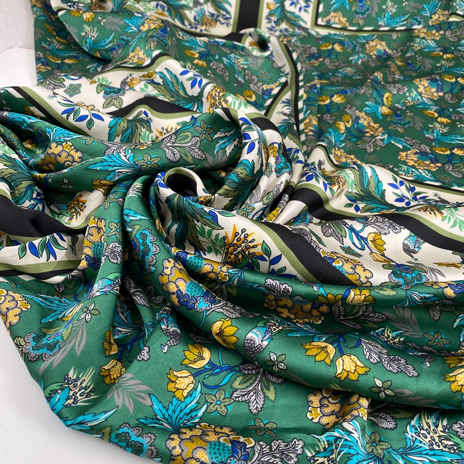 Polyester satin with floral design in panels, in white, green, and olive green shades. Very soft, light, and flowy. High-quality deadstock collected in Stock from a Maison de Couture in Italy.