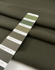 Very soft and flowy viscose/polyester cady in dark olive green, double face and not transparent. High-quality deadstock collected in Stock from a Maison de Couture in Italy.