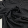 Light cady in black polyester very soft and light. High-quality deadstock fabric collected in Stock from a Maison de Couture in Italy. Light cady in black polyester very soft and light. High-quality deadstock fabric collected in Stock from a Maison de Couture in Italy.