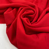 Viscose crepe, stretch in red color reference Tomato. Very soft, light, and flowy. Ideal for trousers, skirts, dresses, and blouses. High-quality deadstock collected in Stock from a Maison de Couture in Italy. Viscose crepe, stretch in red color reference Tomato. Very soft, light, and flowy. Ideal for trousers, skirts, dresses, and blouses. High-quality deadstock collected in Stock from a Maison de Couture in Italy.
