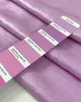 Viscose and polyester light cady, very shiny in orchid violet. Very soft and flowy. High-quality deadstock fabric by the meter collected in Stock from a Maison de Couture in Italy.