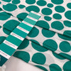 Pure viscose jersey with big green Pois dots on a white background. very soft, stretch, and light. High-quality deadstock fabric collected in Stock from a Maison de Couture in Italy. Pure viscose jersey with big green Pois dots on a white background. very soft, stretch, and light. High-quality deadstock fabric collected in Stock from a Maison de Couture in Italy.