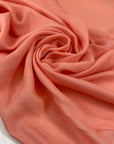 Pure viscose in peach color, very soft and light, flowy. Ideal for shirts, blouses, dresses, and skirts. High-quality deadstock fabric by the meter collected in Stock from a Maison de Couture in Italy