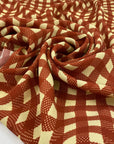 Pure viscose with vanilla yellow ground and optical check in orange rost, very soft and light, flowy. High-quality deadstock fabric by the meter collected in Stock from a Maison de Couture in Italy.