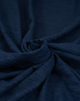 Stretchy and transparent blue pure cotton jersey. High-quality deadstock fabric collected in Stock from a Maison de Couture in Italy.