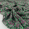 Viscose and wool crepe with a beautiful small flower design, the ground is green and the flowers are in white, fuchsia, and black shades. It is very soft and light. High-quality deadstock fabric by the meter collected in Stock from a Maison de Couture in Italy. Viscose and wool crepe with a beautiful small flower design, the ground is green and the flowers are in white, fuchsia, and black shades. It is very soft and light. High-quality deadstock fabric by the meter collected in Stock from a Maison de Couture in Italy.