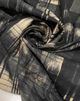 Soft and lightweight pure cotton with a geometric design in shades of gray and black. Not transparent, ideal for dresses, blouses, skirts, and shirting.High-quality deadstock collected in Stock from a Maison de Couture in Italy.