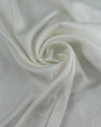 White pure silk twill, soft, fluid and non-stretch. Perfect for dresses and blouses. High-quality deadstock collected in Stock from a Maison de Couture in Italy.