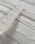 Jacquard net in cotton and polyester with striped design, in star white color. Very light and soft, transparent. Ideal for dresses, skirts, shirting, and blouses. High-quality deadstock collected in Stock from a Maison de Couture in Italy.