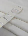 Pure viscose crepe cady in white, very soft, light, and flowy. Just a bit transparent. High-quality deadstock fabric collected in Stock from a Maison de Couture in Italy.