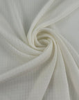 White silk-blend crepe de chine with micro jacquard pattern and non-stretch. High-quality deadstock collected in Stock from a Maison de Couture in Italy.