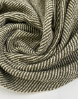 Tweed in a viscose and cotton blend with a soft hand and elegant texture. Ideal for jackets, skirts, and light coats. High-quality deadstock collected in Stock from a Maison de Couture in Italy.