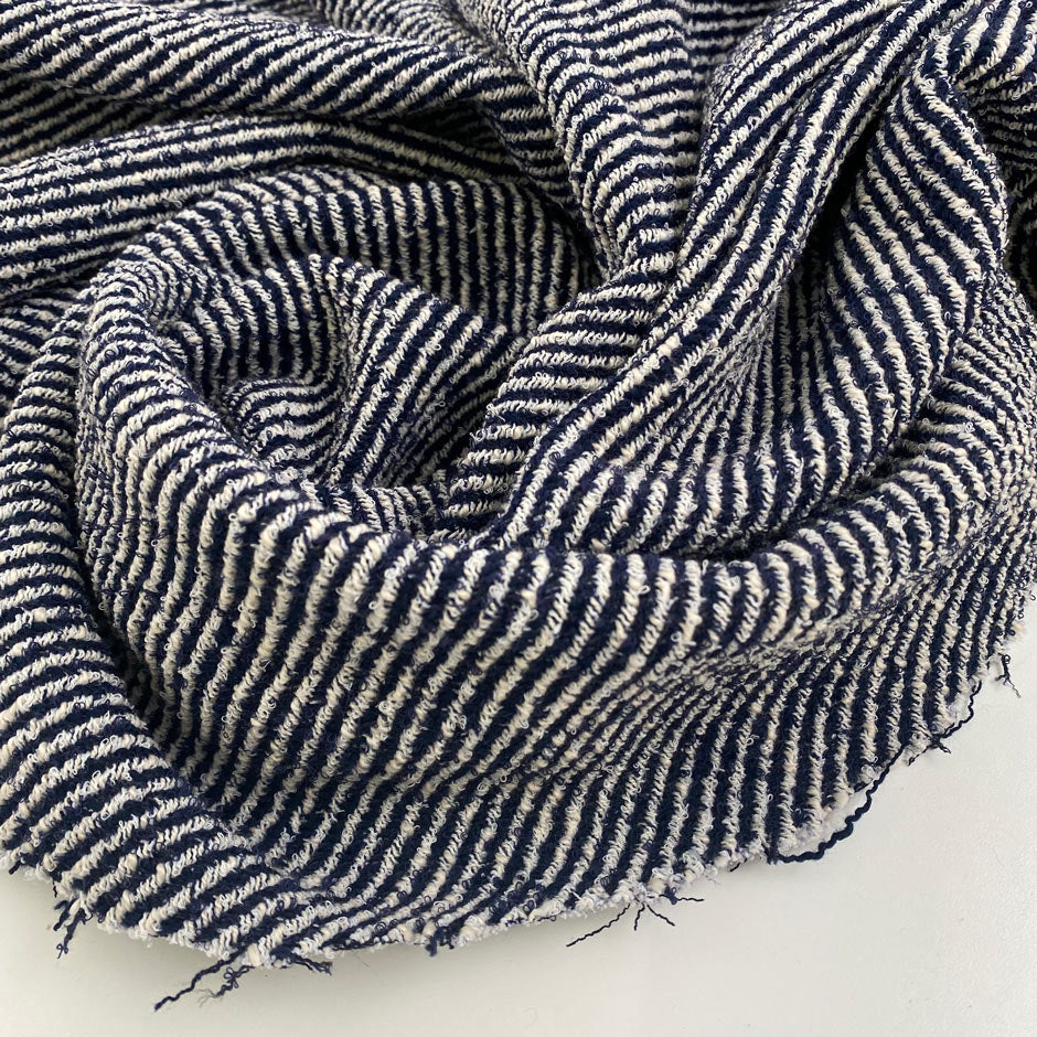 Blue and white viscose and cotton droopy blend tweed. High quality deadstock fabric.