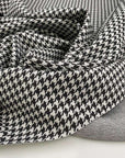Soft and structured, black and white, viscose and polyamide fabric witha geometric pattern. High quality deadstock fabric.