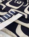 Pure viscose crepe in dark blue and beige shades, with a very big geometrical design. Very soft and light. High-quality deadstock fabric by the meter collected in Stock from a Maison de Couture in Italy.