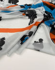 Printed polyester voile worked with soft transparent fluid crepe