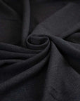 Dark gray stretch and structured wool crepe. High quality deadstock fabric.
