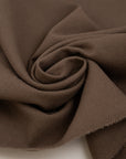 Pure soft and structured brown shetland wool. High quality deadstock fabric.