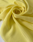 Light and soft yellow silk crêpe de chine with a fluid drape and slight transparency. Perfect for dresses, blouses, skirts, and shirting.
High-quality deadstock collected in Stock from a Maison de Couture in Italy.