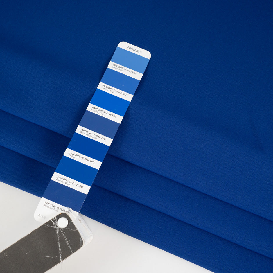 Stretching and falling blue technical fabric. High quality deadstock.