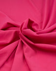 Soft and comfort silk crepe fabric in fuchsia. High quality deadstock fabric