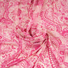 Glossy polyester satin fabric printed with fuchsia, pink and white cashmere pattern. High quality deadstock fabric.