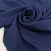 Crepe de chine in acetate and silk in navy blue. It is very light, soft, and structured. High-quality deadstock fabric by the meter collected in Stock from a Maison de Couture in Italy.