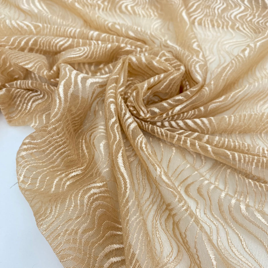 Soft and light stretch tulle with abstract embroidery in Apricot Illusion. Delicate and elegant, ideal for dresses, skirts, blouses, and shirting.
High-quality deadstock collected in Stock from a Maison de Couture in Italy.