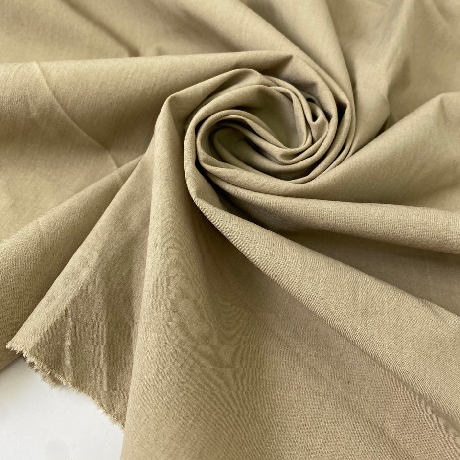 Soft stretch fabric in a wool cotton and polyamide blend. Versatile and comfortable, ideal for trousers, dresses, skirts, and jackets.High-quality deadstock collected in Stock from a Maison de Couture in Italy.